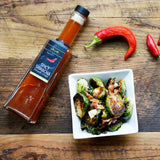 Bacon and Sriracha Roasted Brussels Sprouts made with Olivelle Caramelized Garlic Infused Olive Oil and Sriracha Sea Salt
