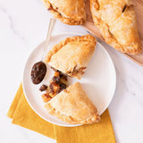 Golden Caramelized Onion Cornish Pasties made with Blake Hill Caramelized Onion Savory Jam, filled with beef, potato, and rutabaga