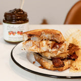 Apple and cheddar grilled cheese with Blake Hill Heirloom Apple with Maple Jam, crispy bacon, and sharp cheddar on artisan bread