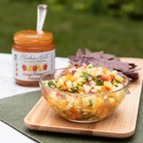 Mango Pineapple Habanero Salsa made with Blake Hill Mango Habanero Chili Jam, fresh pineapple, red and orange bell peppers, red onion, and cilantro, served with blue corn chips