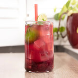 Triple Berry Mojito Mocktail made with Blake Hill Naked Triple Berry Spread, fresh mint, lime, and lime seltzer in a glass with ice