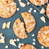 Gluten-free Mango Pineapple Habanero White Chocolate Cookies made with Blake Hill Mango Habanero Chili Jam, white chocolate chips, and freeze-dried pineapple, drizzled with white chocolate