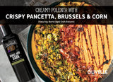 Creamy polenta topped with crispy pancetta, roasted Brussels sprouts, corn, and a balsamic drizzle