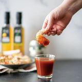 Baked Coconut Shrimp with Sweet Chili Dipping Sauce made with Olivelle Pineapple Habanero White Barrel Aged Balsamic, Sweet Smoked Chili Rub, and Chili Verde Flake Sea Salt