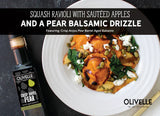 Squash ravioli with sauteed apples, spinach, goat cheese, pumpkin seeds, and a pear balsamic drizzle