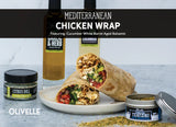 Mediterranean chicken wrap with cucumber, tomato, red onion, feta, spinach, and tahini dressing