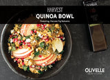 Harvest quinoa bowl with marinated chicken, kale, apple, pomegranate seeds, hazelnuts, and feta