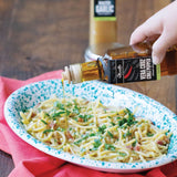 Pici Carbonara made with Olivelle Parmesan Asiago Dipper and Vera Cruz Chili Infused Olive Oil