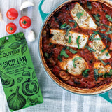 Puttanesca poached fish with olives, capers, and fresh basil in a rich tomato sauce