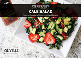 Strawberry kale salad with avocado, cucumber, sunflower seeds, and a strawberry balsamic dressing