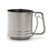 Stainless steel mug with handle on a white background