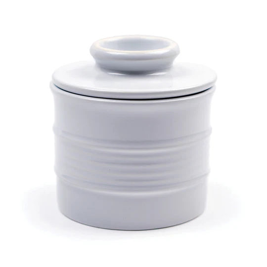 White ceramic container with lid on a white background