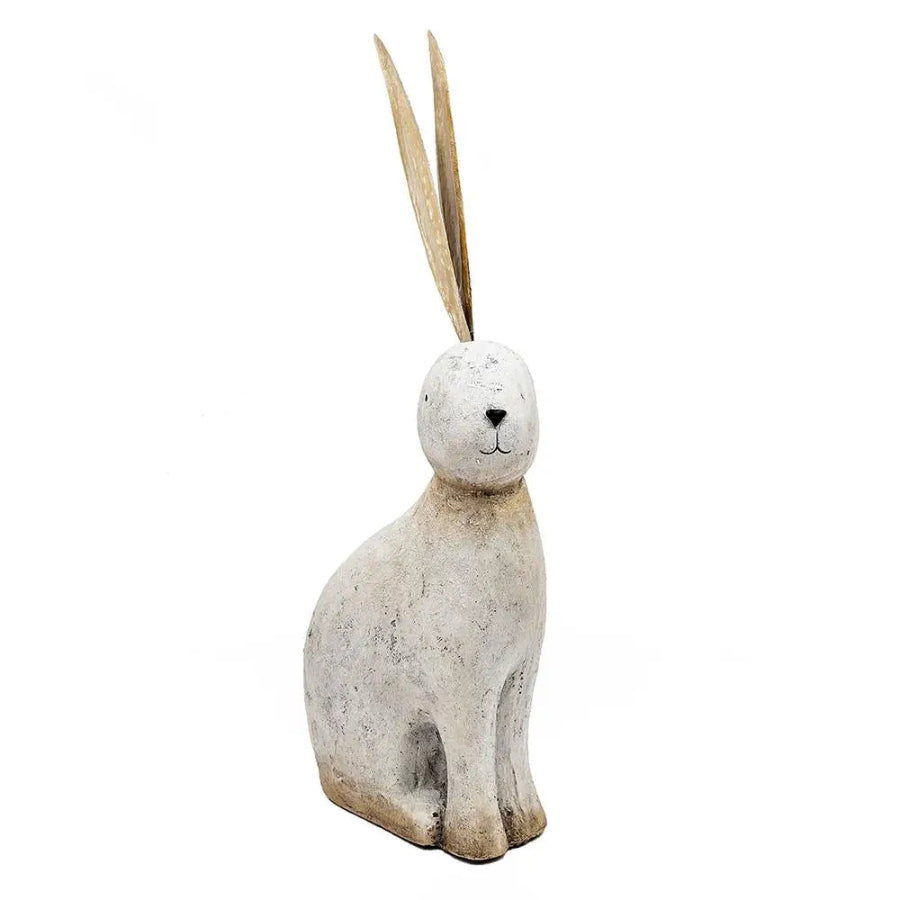 Decorative rabbit figurine with long ears on a white background