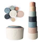 Stackable cups with numbers and animal shapes on a white background