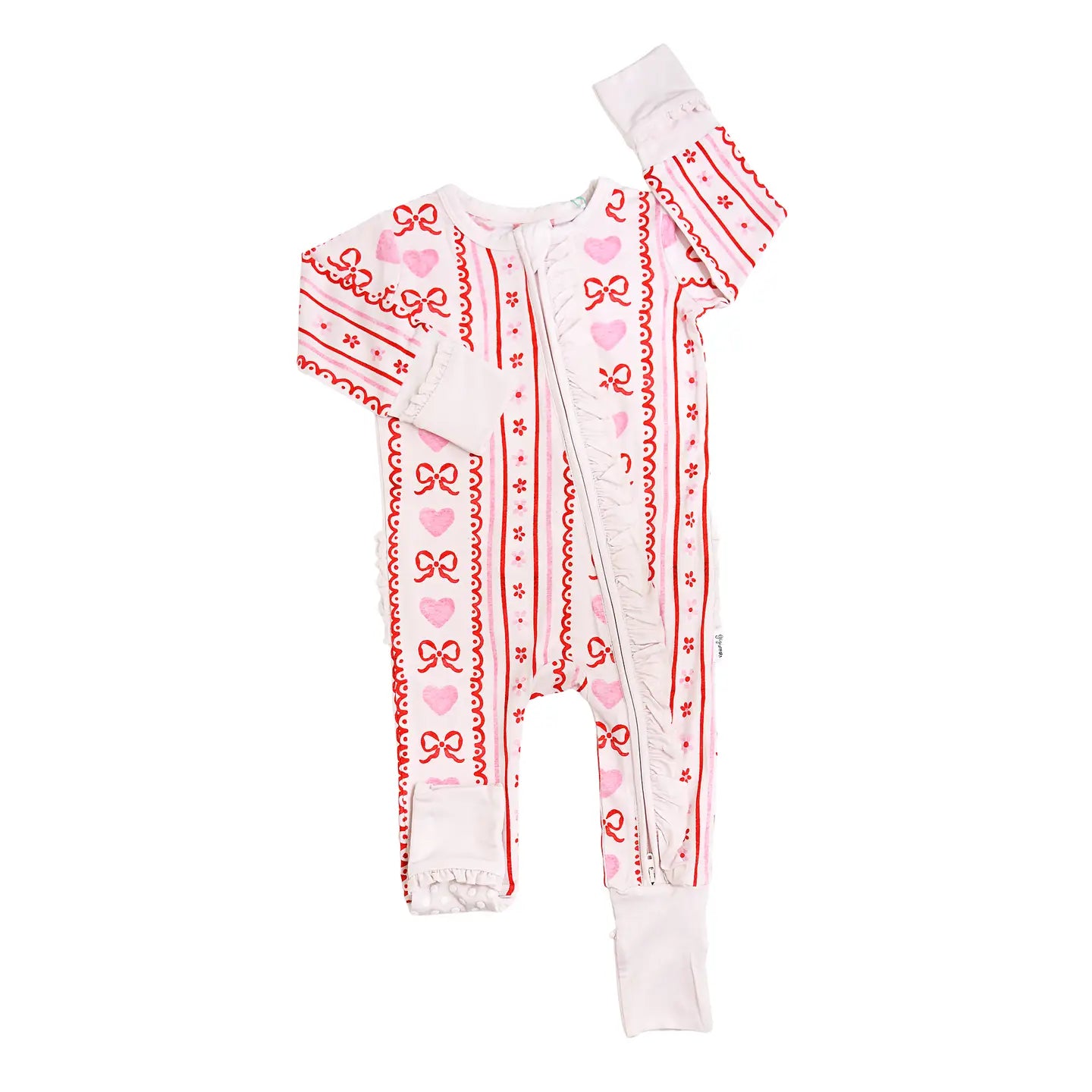 Baby onesie with red and pink patterns on a white background