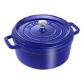 Blue enameled cast iron cocotte with a lid on a white background