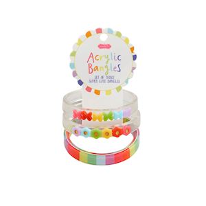 Set of colorful acrylic bracelets in a clear plastic packaging on a white background