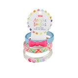 Set of acrylic bracelets with a bow design on a white background