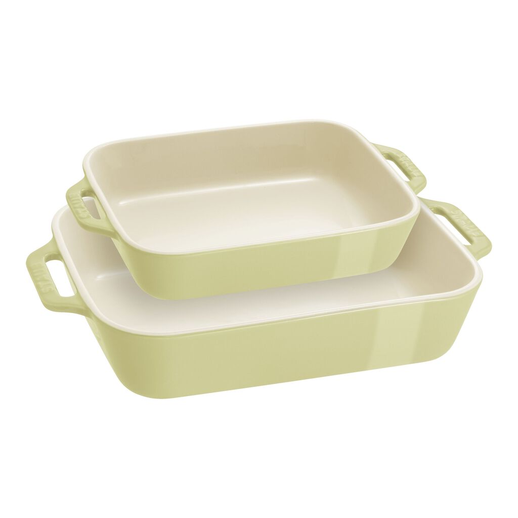 Set of three green rectangular baking dishes on a white background