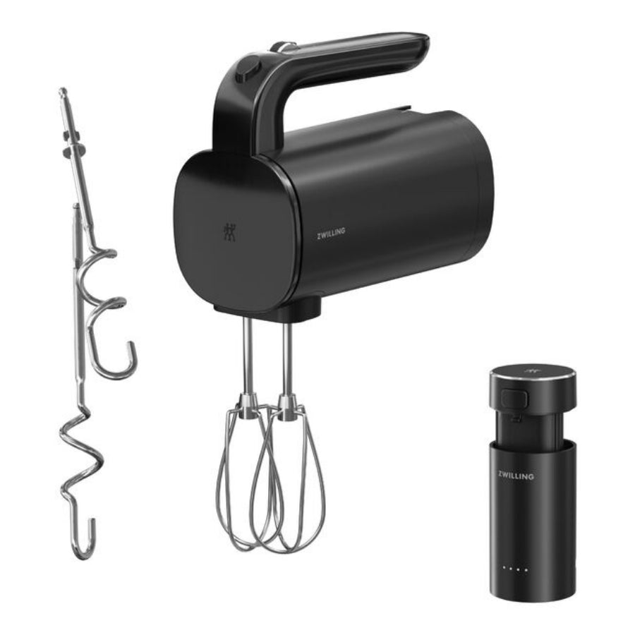 Black hand mixer with attachments on a white background