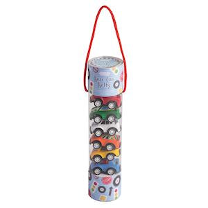 A tall cylindrical storage tube filled with small toy cars in multiple colors, with a red hanging loop at the top and a printed label near the cap.