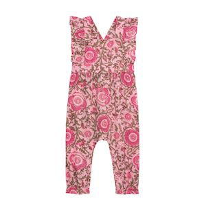 Pink floral patterned bib overalls on a white background