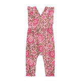 Pink floral patterned bib overalls on a white background