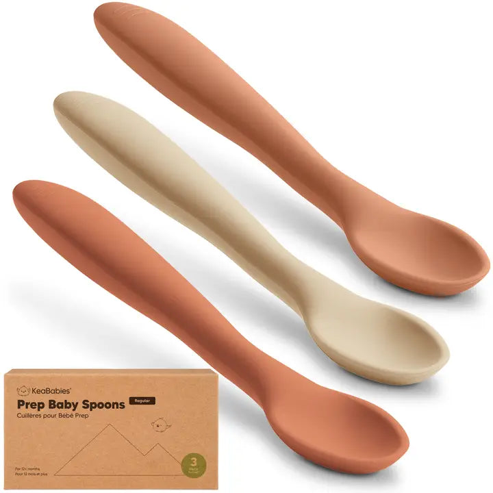Three baby spoons in terracotta and beige colors with a KeaBabies packaging box.