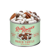 Green tin of 'Naked Turtle' candy with pecans and white candies on a white background