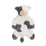 Plush cow toy with black and white pattern on a white background