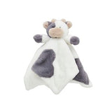 Plush cow toy with a white and gray pattern on a white background