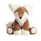 Plush toy fox with white fur on a white background