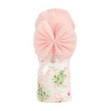 pink hat w a baby swaddle