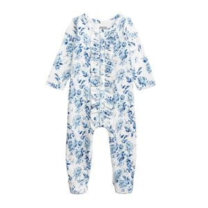 Floral patterned baby onesie on a white background