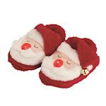 Red slippers with white faces resembling Santa Claus on a white background