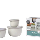 Set of white nesting bowls with a Mépal packaging box on a white background