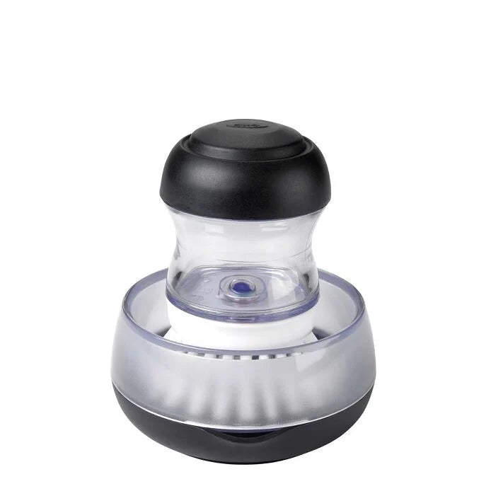 Black and silver pepper grinder on a white background