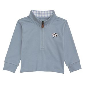 Blue long-sleeve shirt with a cow design on a white background
