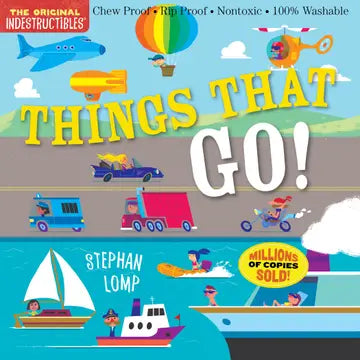 Children's book cover titled "Things That Go!" by Stephan Lomp, featuring colorful cartoon illustrations of vehicles, a hot air balloon, a helicopter, a sailboat, a boat, and flying objects on a bright illustrated background. Text at the top reads "The Original Indestructibles" and includes claims like chew proof, rip proof, nontoxic, and 100% washable.