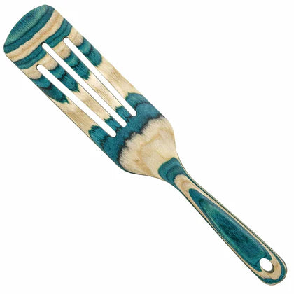 Wooden spatula with blue and green design on a white background