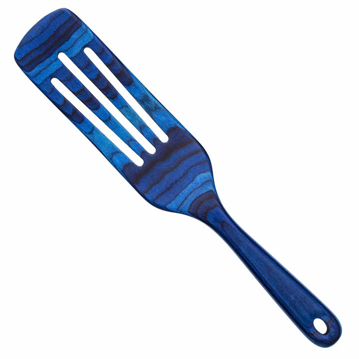 Blue marbled slotted spatula on a white background