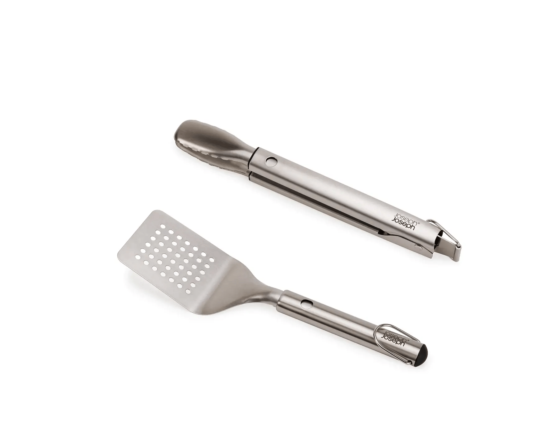 Stainless steel spatula and grill tool on a white background