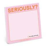 A pink sticky note pad with orange text reading 'SERIOUSLY?' at the top and a small checkbox note at the bottom right, shown on a white background.