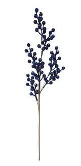 A single decorative artificial branch with clusters of dark blue berry-like spheres on a thin brown stem, isolated on a white background.