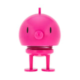 Pink robot toy with a simple design on a white background