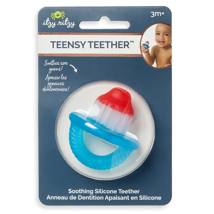 Itzy Ritzy Teensy Teether packaging with blue and red teether on a white background
