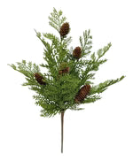 A single artificial pine branch with green needle-like foliage and several brown pinecones on a plain white background.