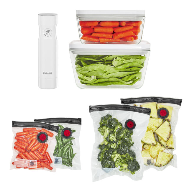 Set of vacuum-sealed containers with vegetables and a white  vacuum device on a white background