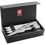 Box of silver metal steak knifes 