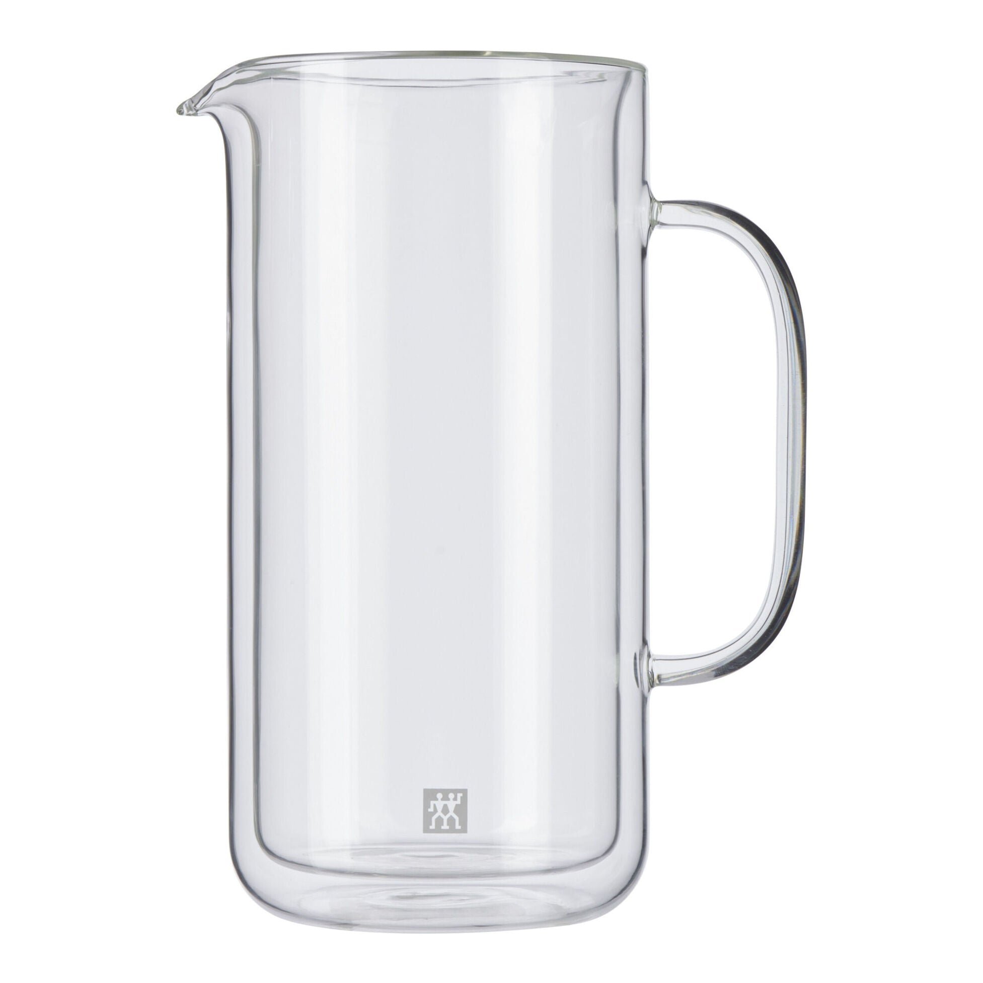 Clear glass pitcher with handle on a white background